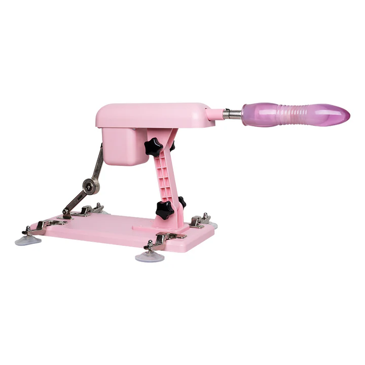 Máquina sexual Sonya en color rosa con dildo rosado instalado y ventosas de sujeción para superficies planas.
