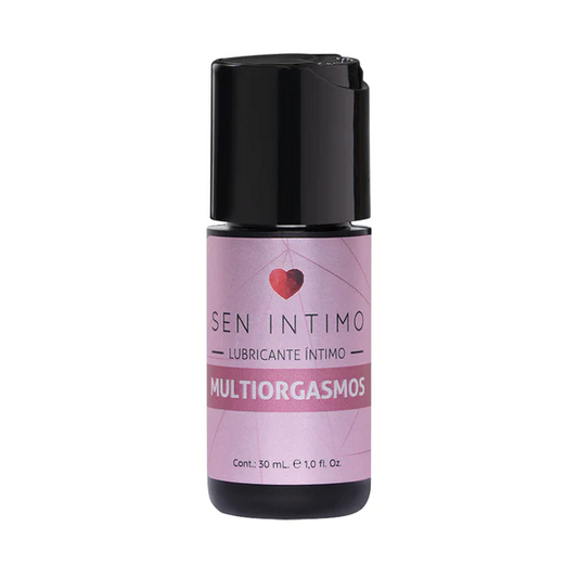un envase compacto de "Lubricante Íntimo Multiorgasmos Sen Intimo". El empaque es predominantemente morado con detalles en rosa y blanco, destacando una etiqueta con un corazón rojo y el nombre del producto. El frasco es pequeño y portátil, con una tapa negra y una capacidad de 30 mL