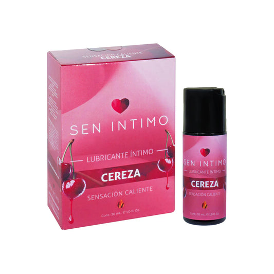 Caja y frasco del lubricante caliente sabor cereza Sen Íntimo 30 ml rodeados de cerezas sobre fondo rojo.