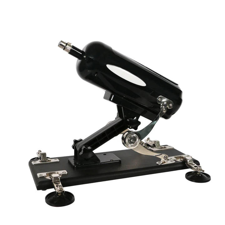 Máquina sexual con base metálica y motor ajustable, equipada con ventosas para mayor estabilidad.